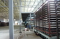 Linea di produzione del pannello a sandwich del circuito idraulico, macchina del pannello del tetto del MgO del cemento